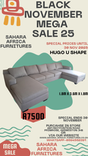 Load image into Gallery viewer, Advertisement for Sahara Africa Furnitures' Black November Mega Sale with a sectional sofa and promotional text.